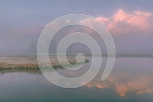 Lake mountains fog reflection sunrise