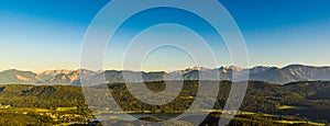 Lake and mountains at Worthersee Karnten Austria. View from Pyramidenkogel tower on lake and Klagenfurt the area