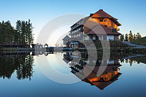 The lake Mummelsee and the mountain hotel in Seebach