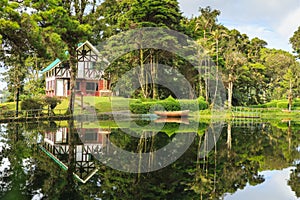 Lake house with canoe at the Selva Negra Nicaragua photo