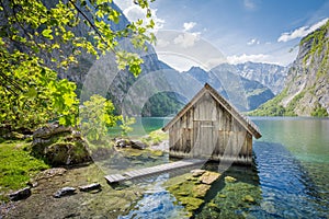 Lake Obersee with boat house in summer, Bavaria, Germany