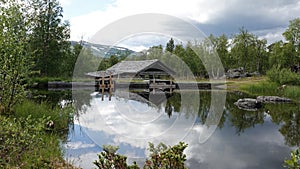 Lake and Old wooden saw mill in Adolfstrom, Sweden