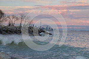Lake Ontario at sunset with Toronto city skyline and CN Tower in the background. photo