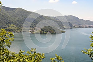 Lake panorama from `Monte Isola`. Italian landscape. Island on lake. View from the island Monte Isola on Lake Iseo, Italy