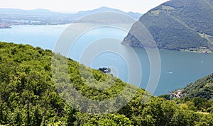 Lake panorama from `Monte Isola`. Italian landscape. Island on lake. View from the island Monte Isola on Lake Iseo, Italy