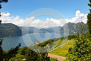 Lake panorama from `Monte Isola`. Italian landscape. Island on lake. View from the island Monte Isola on Lake Iseo, Italy