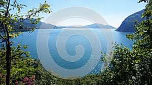 Lake panorama from `Monte Isola`. Italian landscape. Island on lake. View from the island Monte Isola on Lake Iseo, Italy