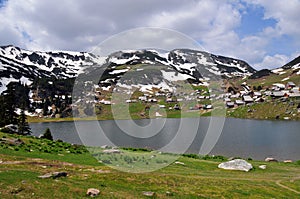 Lake and pasture squads at 1650 meters above sea level photo