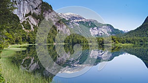 Mirrored mountains in the Patagonian Lakes photo