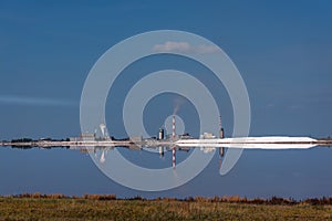 Lake plant sodium sulfate reflections sky