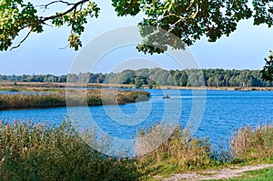 Lake or pond for fishing, the fishermen on the boat, the scenery is beautiful pond