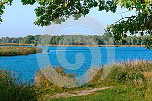 Lake or pond for fishing, the fishermen on the boat, the scenery is beautiful pond