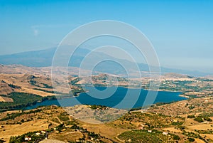 The lake of Pozzillo, with volcano Etna in background