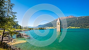 Lake Resia, Ortler mountains and church tower Alto Adige, Italy