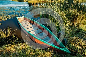 Lake Or River And Old Wooden Blue Rowing Fishing Boat At Beautiful