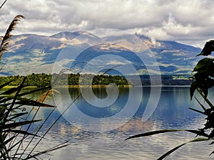 Lake Rotoaira and Mount Tongariro volcano in a claudy day afternoon