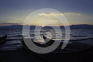 Lake scenery, sunset, fishing boat dock