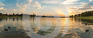 Lake schwarzl sunset panorama schwarzlsee near the styrian capitol Graz in Austria.