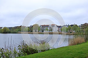 The Lake Schwerin (German: Schweriner See) at the castle and the city on a cloudy day