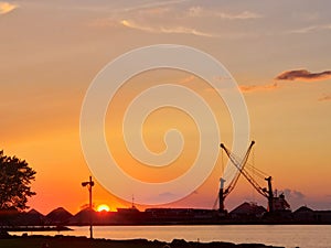 Lake shore park beach industrial cranes numero dos photo