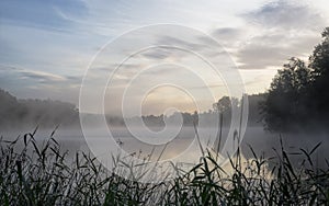 Lake shrouded in morning haze