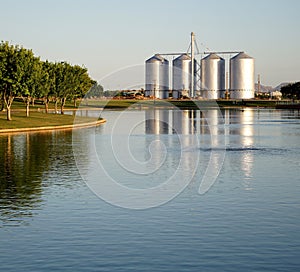 Lake with Silos in the Background photo
