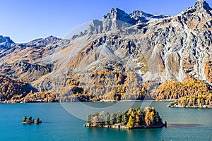 Lake Silsersee and small islets at St. Moritz of Swiss alps