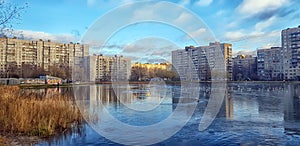 Lake in a small park in the city in a modern residential area