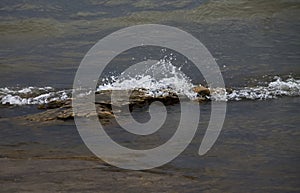 Lake Splash On Limestone Bedrock