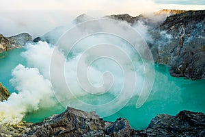 Lake and Sulfur Mine at Khawa Ijen Volcano Crater, Java Island, Indonesia.