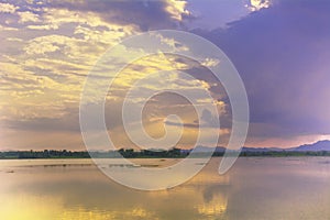 Lake summer with reflection of clouds on water surface