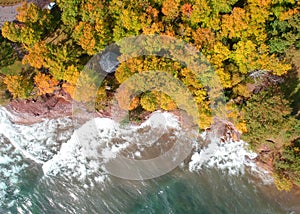 Lake superior shore with autumn trees in Michigan upper peninsula