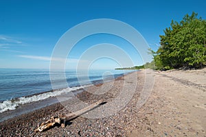 Lake Superior shoreline on a sunny summer`s day off coast in the Upper Peninsula of Michigan photo