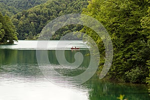 Lake surrounded by green mountains