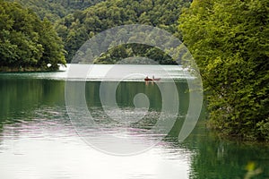 Lake surrounded by green mountains