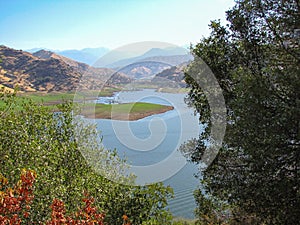 Lake surrounded by mountains landscape