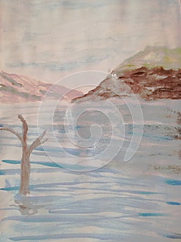 Lake surrounded by mountains that are reflected in water,the dry tree peeks out of the lake,sunset over the lake painted in waterc