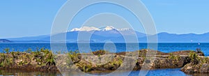 Lake Taupo and snow capped mountains, New Zealand