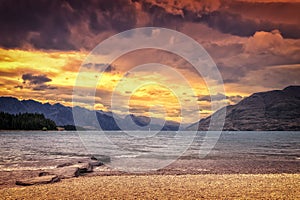 the Lake Te Anau in New Zealand at sunset