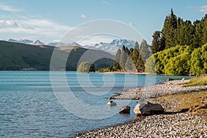 Lake Tekapo and snow capped mountains in New Zealand