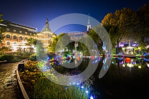 The lake at Tivoli Gardens at night, in Copenhagen, Denmark.