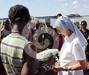 Nuns of Christian church buy handicrafts african tribe