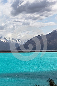 Lake with turquoise water among the mountains in the Southern Alps. South Island, New Zealand