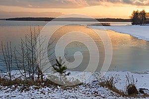 Lake Uvildy in november at sunset in late autumn, Southern Urals, Russia photo
