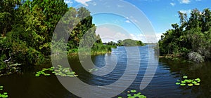 Lake & vegetation on its banks photo