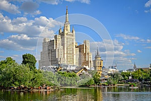 Lake view of the Stalin skyscraper building on Barrikadnaya Square