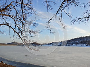 Frozen lake view winterscape photo