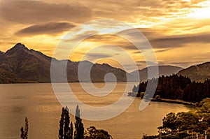 Lake Wakatipu at sunset, Otago, South Island, New Zealand, Oceania photo