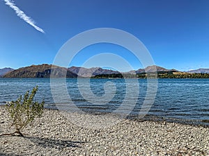Lake Wanaka and the Southern Alps, with surrounding landscape in Wanaka, Otago, South Island, New Zealand