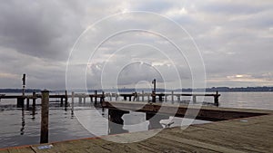 Lake Washington boat docks on an overcast, slightly rainy day, no one around